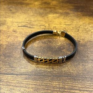 Black and Gold Bracelet with Silver Accents